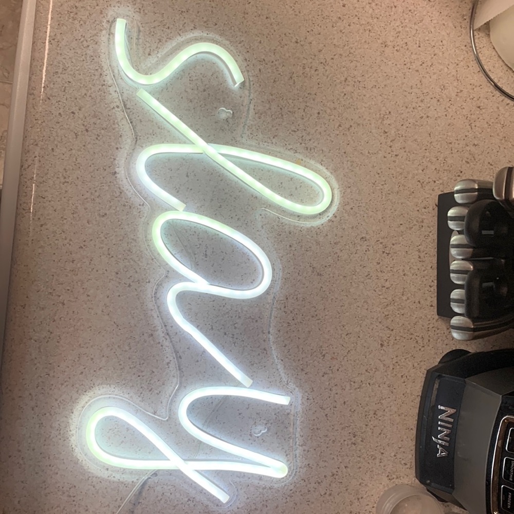 “Slay” neon sign